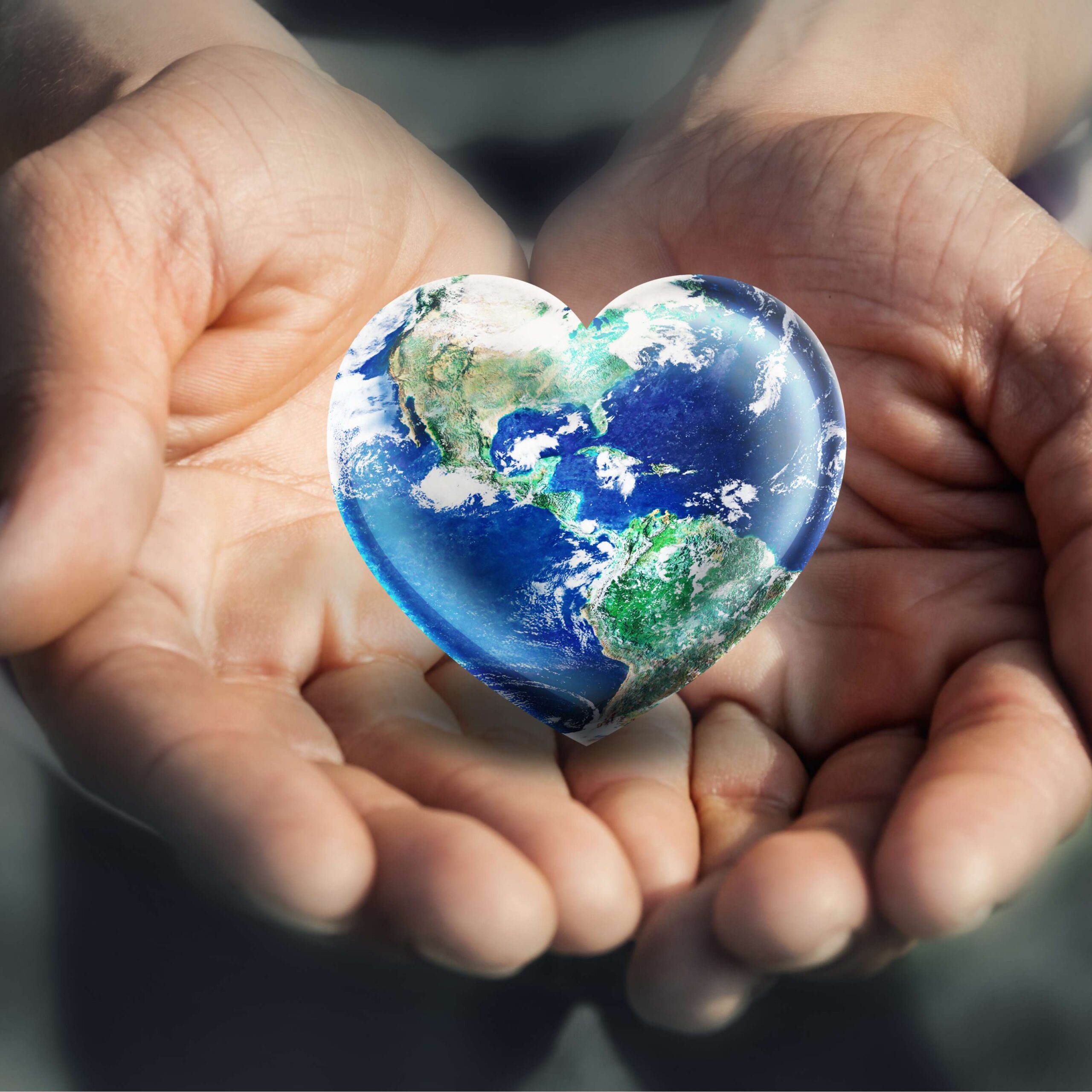 Earth day_Hand hält Erde Hände halten herzförmige Erde – Planetary Health Diet für Gesundheit und Nachhaltigkeit